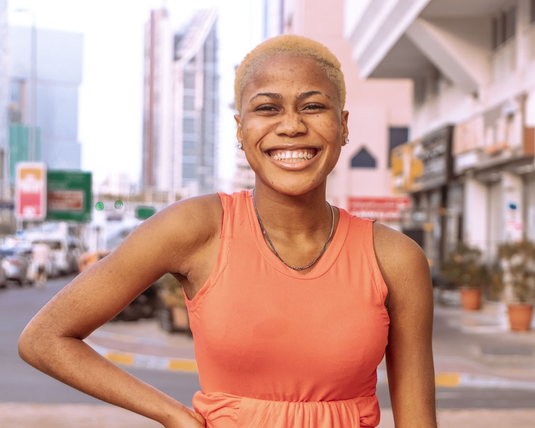 A confident, happy woman out in the city